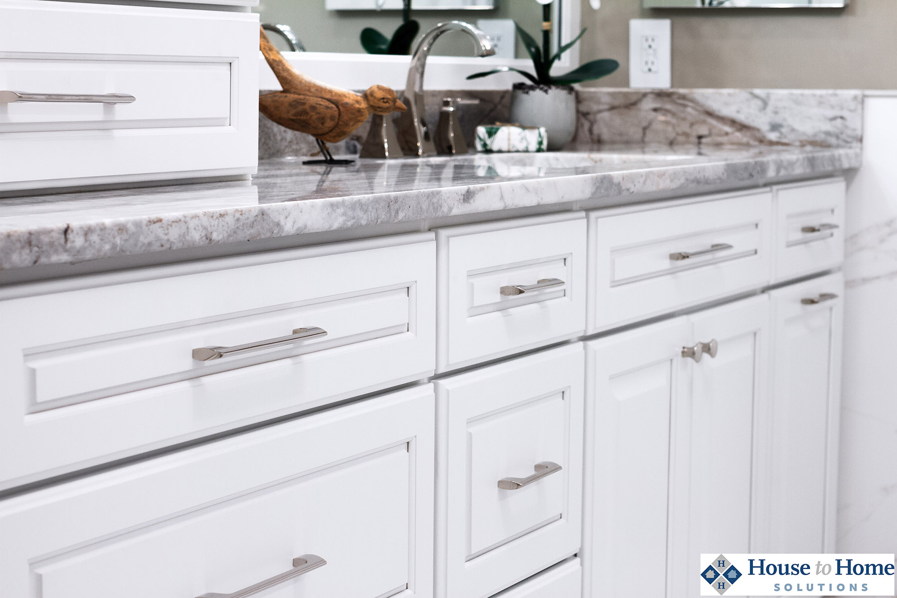 This customer is very happy with their new white painted bathroom vanity. Browse these bathroom cabinet reviews to see more kitchen and bathroom cabinetry testimonies from homeowners on their remodel projects with Dura Supreme Cabinetry.